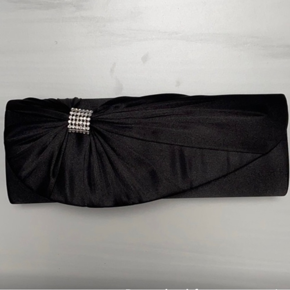 Jessica McClintock black clutch with strap & rhinestone embellishment.